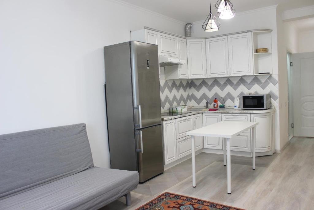 Астана: Comfortable apartment in millennium park 45 m2