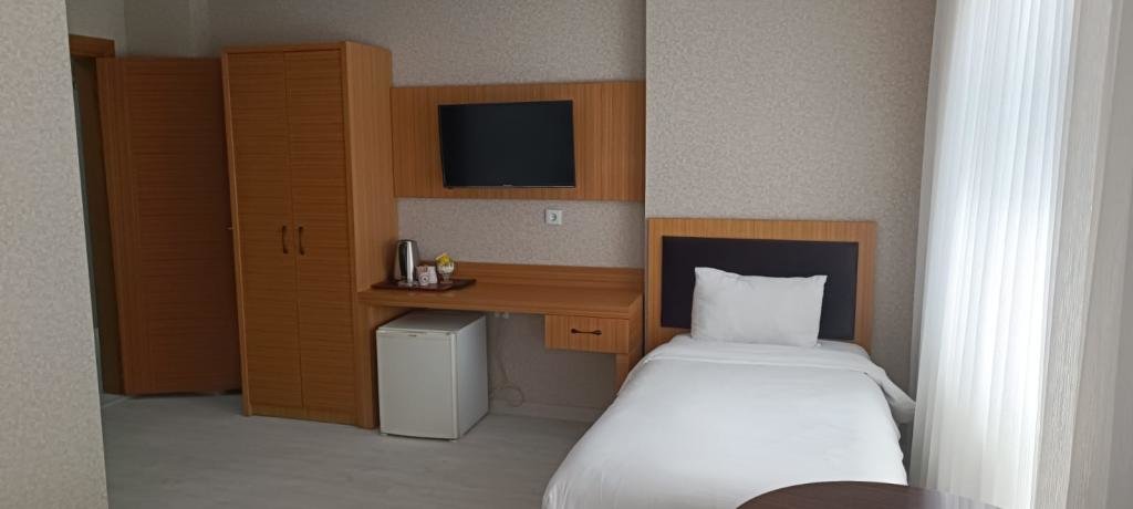 Татван: Hotel Dinc