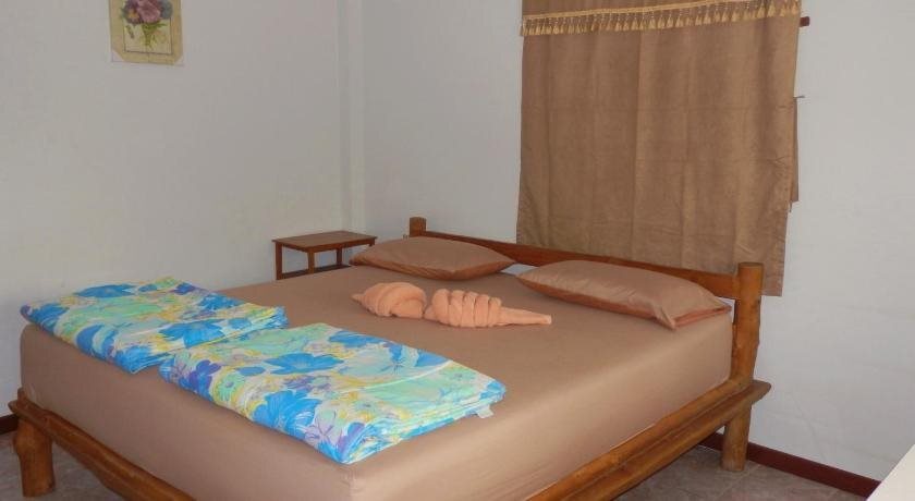 Сукотай: MG Guest House