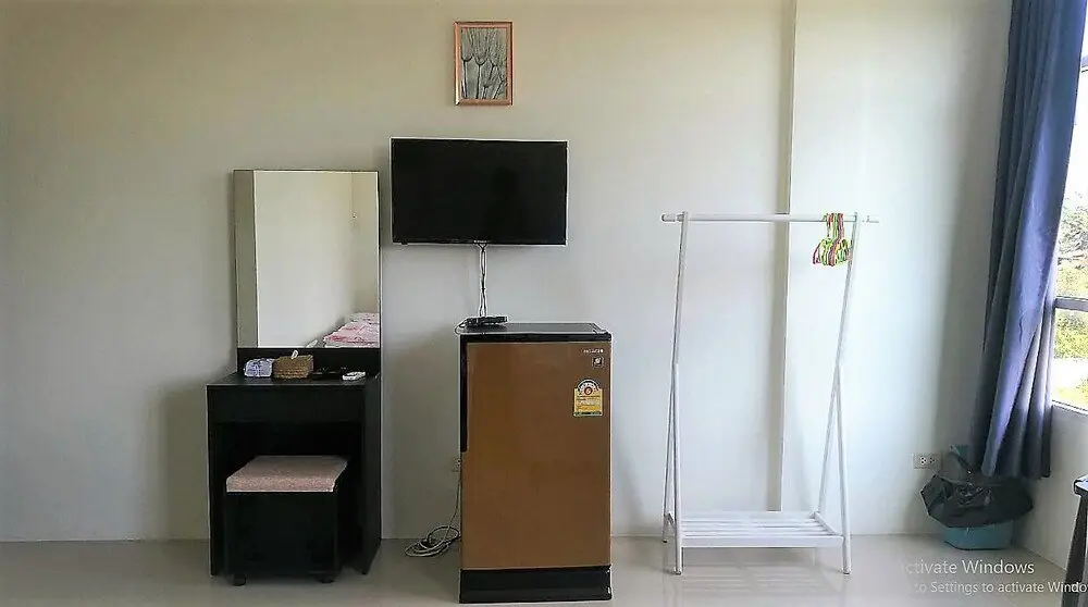 Тхаланг: We Care 2015 Hostel & Souvenir