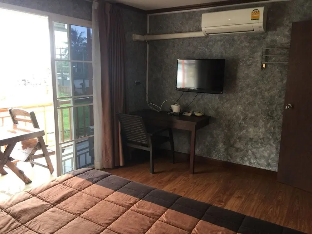 Муанг: PCR Kata Guesthouse