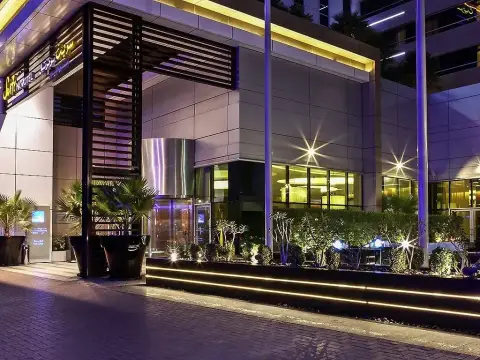 Отель Novotel Suites Mall Avenue Dubai — фото 1