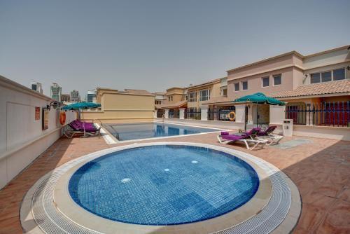 Дубай: J5 Villas Holiday Homes Barsha Gardens
