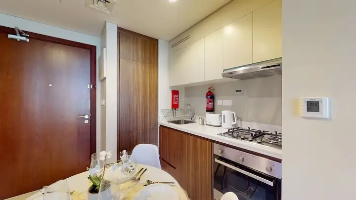 Дубай: WelHome - Cozy 1BR With Private Balcony Steps From the Canal