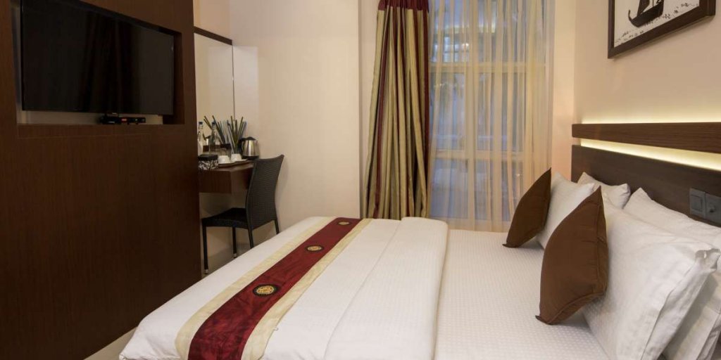 Хулхумале: The White Harp Beach Hotel