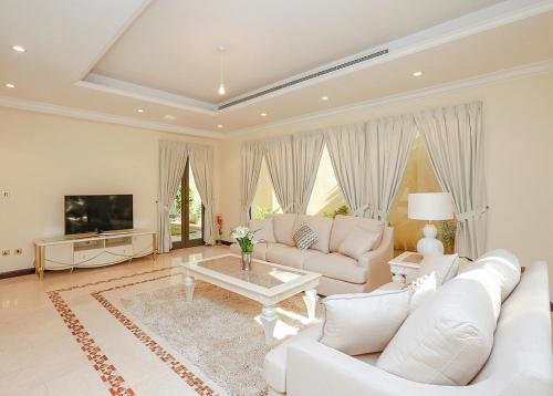 Дубай: Kennedy Towers - Frond P Garden Home