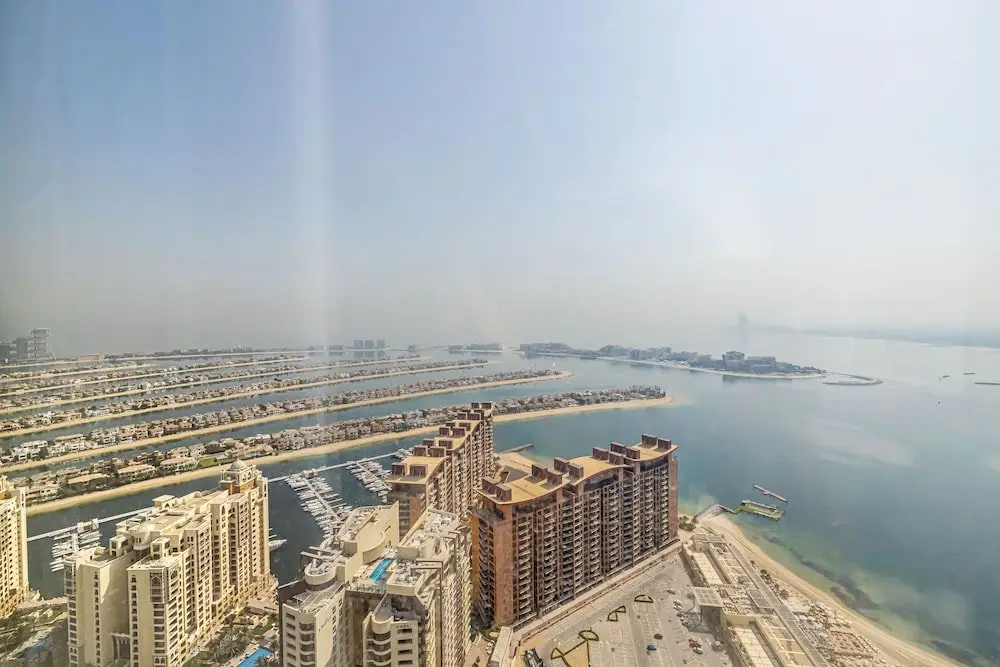 Дубай: Sea Living High Floor 1 Bed Palm Tower