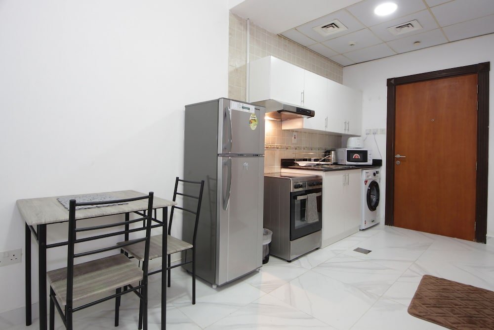 Дубай: Studio Apartment in Palace Tower 2