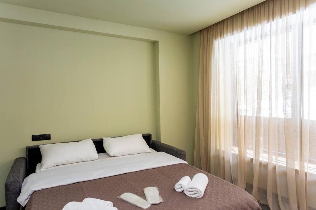 Бакуриани: cozy studio aptartment next to rooms hotel in the hills of beautiful bakuriani
