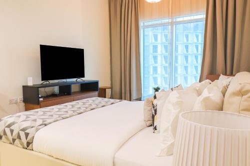 Дубай: Signature Holiday Homes - Newly Furnished Studio in Azizi Aliyah Residences, Al Jaddaf