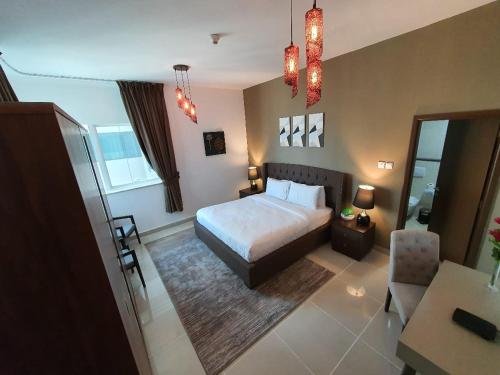Дубай: Al Ashrafia Holiday Home - 2 BDR Marina Pinnacle Tiger