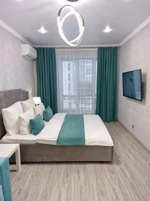Квартира Flatirini с панорамными окнами в новом ЖК — фото 1