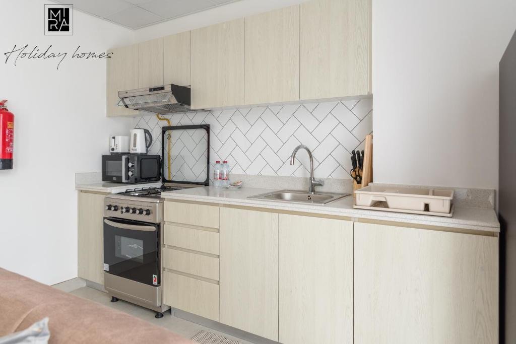 Дубай: Mira Holiday Homes - New 1 Bedroom in Midtown - Dania