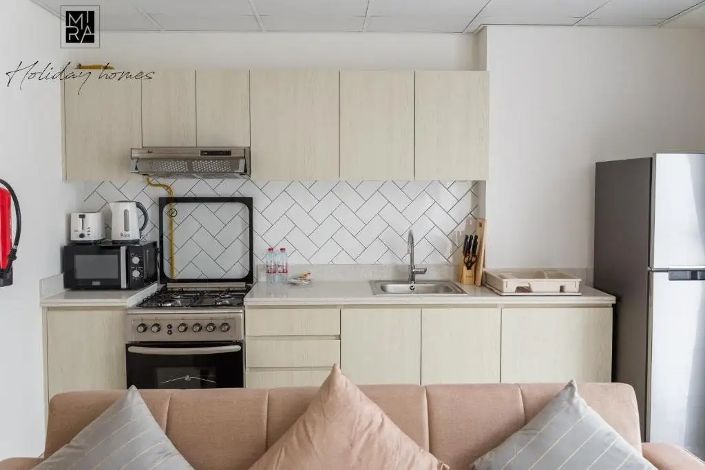 Дубай: Mira Holiday Homes - New One Bedroom in IMPZ