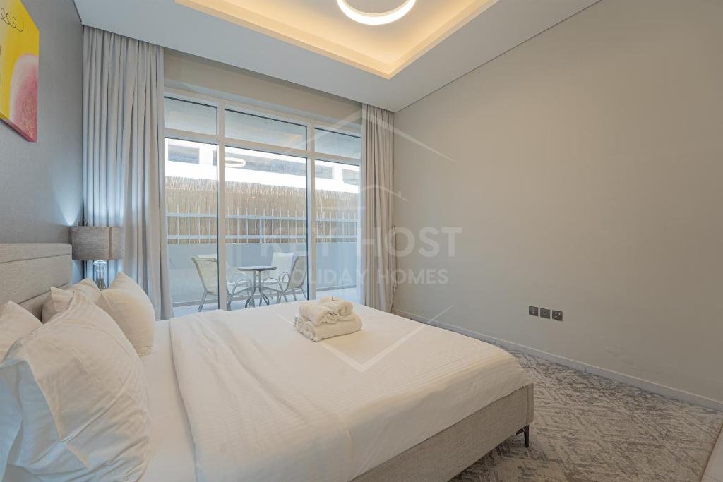 Дубай: KeyHost - Cozy 1BR Apartment Near Five Hotel - JVC - KG40