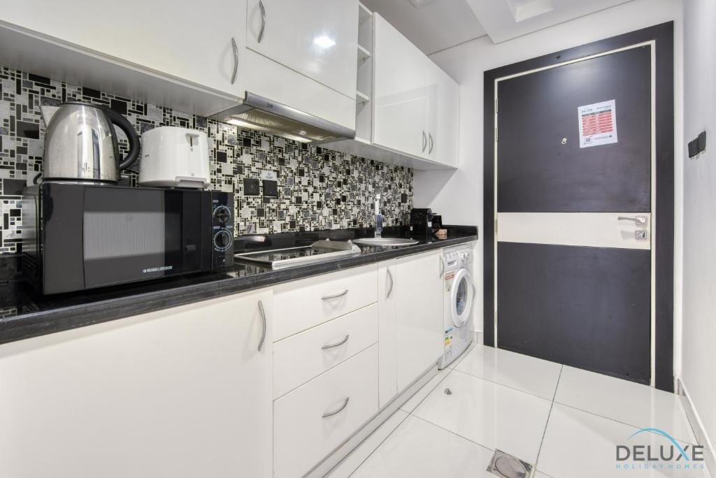 Дубай: Radiant Studio at Giovanni Boutique Suites DSC by Deluxe Holiday Homes