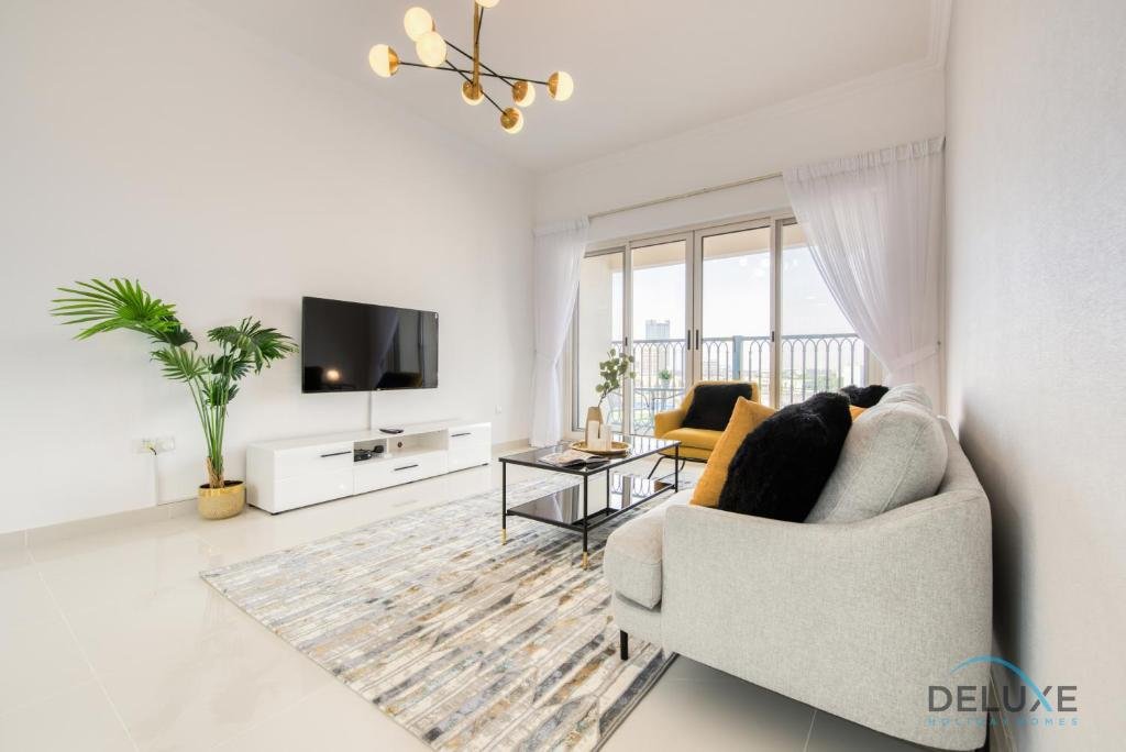 Дубай: Vivid 2BR at Canal Residences West Dubai Sports City by Deluxe Holiday Homes