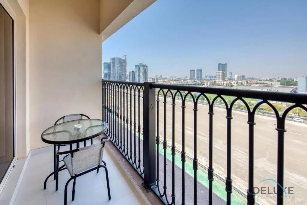 Дубай: Vivid 2BR at Canal Residences West Dubai Sports City by Deluxe Holiday Homes