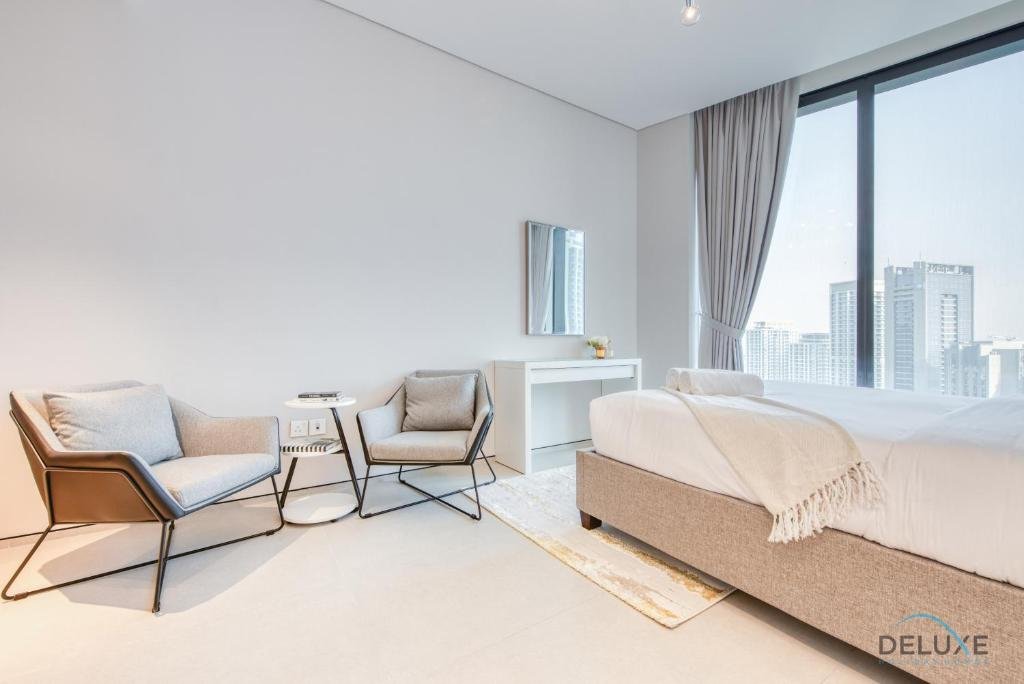 Дубай: Posh 1BR at Jumeirah Gate Tower 1 JBR by Deluxe Holiday Homes