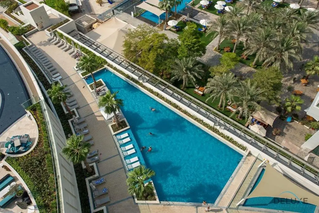 Дубай: Posh 1BR at Jumeirah Gate Tower 1 JBR by Deluxe Holiday Homes