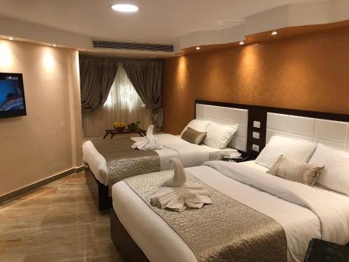Каир: Nile Hunters Suites & Apartments