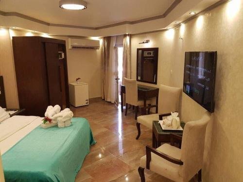 Каир: Nile Hunters Suites & Apartments
