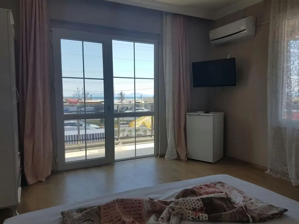 Айвалык: Midilli Otel Sarimsakli