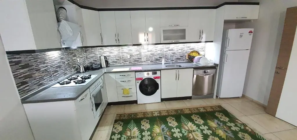 Фетхие: 3+1 sea1km 125mt2 Furnished luxury apartment 1.kat