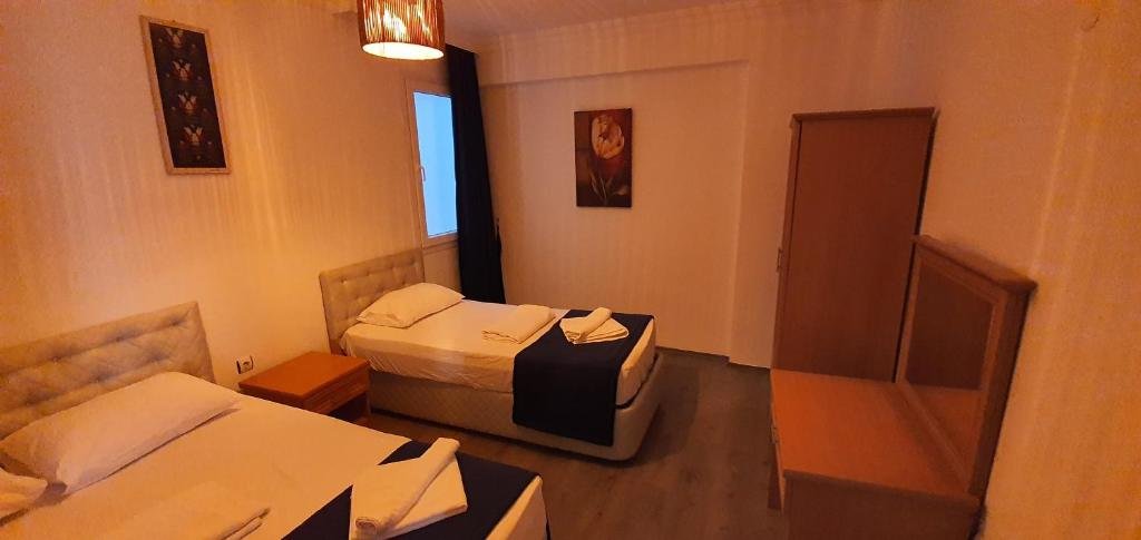 Фетхие: 3+1 sea1km 125mt2 Furnished luxury apartment 1.kat