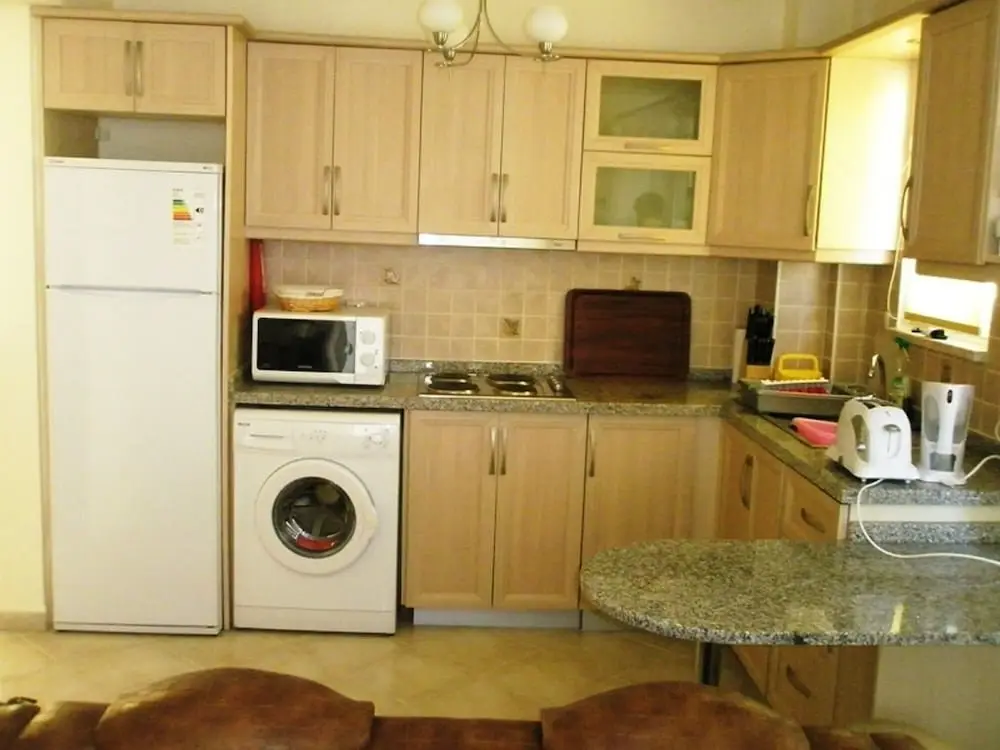 Милас: 2 Bed, 2 Bath Apartment On Private Site Within 300 Metres Of The Beach