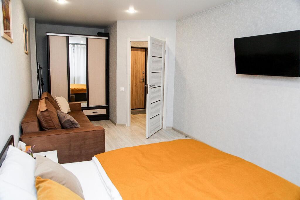 Волгоград: Volga Apartments на улице Гамзатова 19