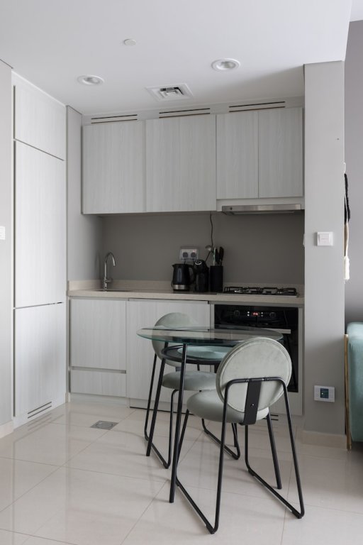 Дубай: Quiet 1BR with river view