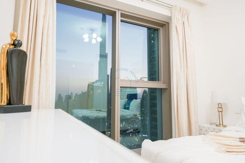 Yogi - Modern 2BR Apartment with Stunning Dubai Fountain — фото 1