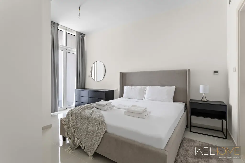 Дубай: Апартаменты WelHome - Breathtaking 1BR Apt with Balcony and City View
