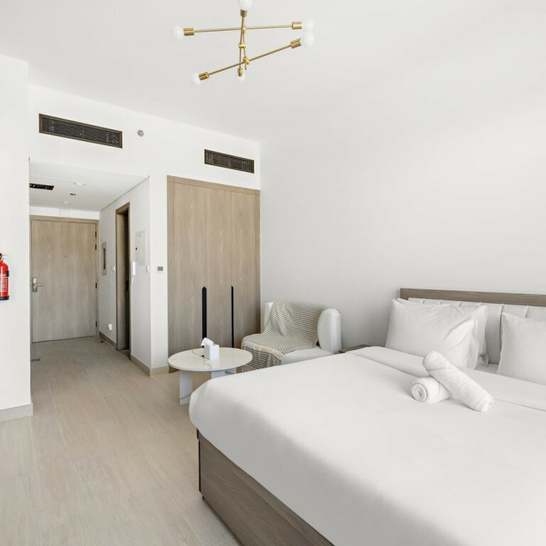 Дубай: Chic Studio in new Residence With Pool Sauna gym