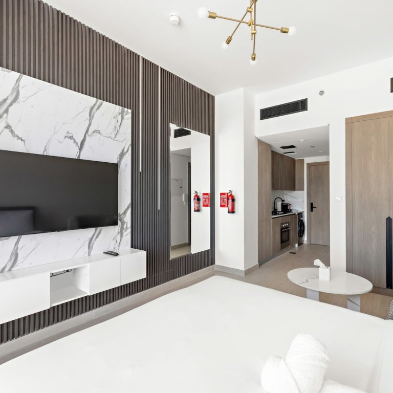 Дубай: Chic Studio in new Residence With Pool Sauna gym