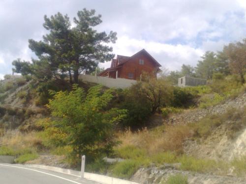 Какопетрия: Agros Timber Log House