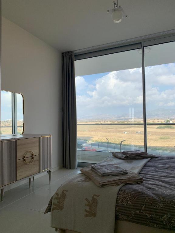 Богаз: Stunning 2 plus 1 apartment for rent in ABELIA RESIDENCE at Bogaz with beautiful sea and mountains views