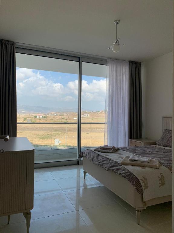 Богаз: Stunning 2 plus 1 apartment for rent in ABELIA RESIDENCE at Bogaz with beautiful sea and mountains views