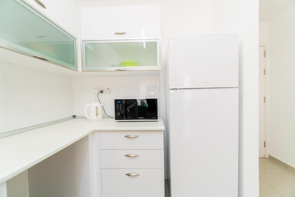 Алсанджак: Spacious Three-Bedroom Apartment with Sea View A4