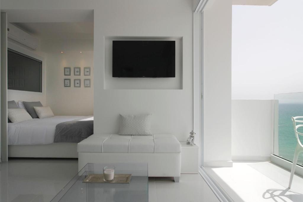 Лимассол: The White Pearl Suite - beach front city centre with sea view.
