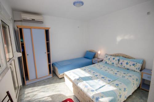 Бусат: Apartments Duskic
