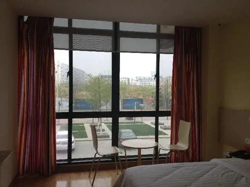Циндао: 7Days Inn Qingdao Huangdao District Government