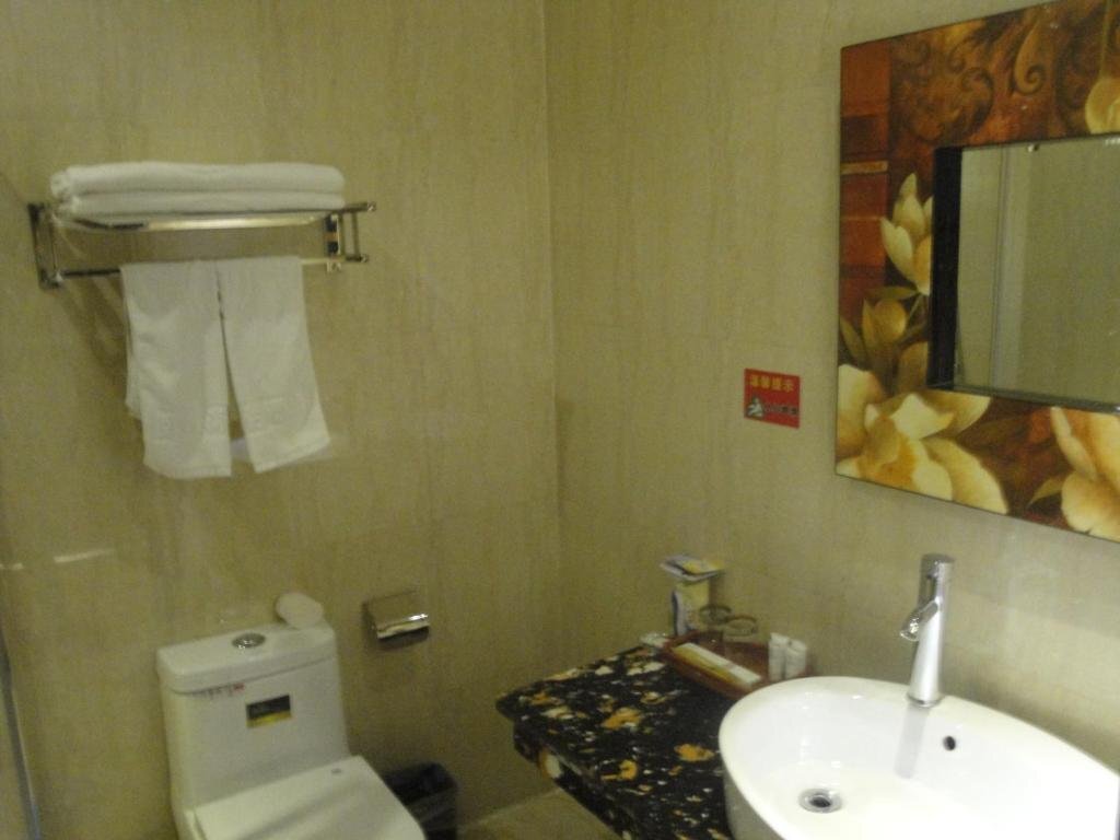 Mudanjiang Wan Zai Business Hotel — фото 1