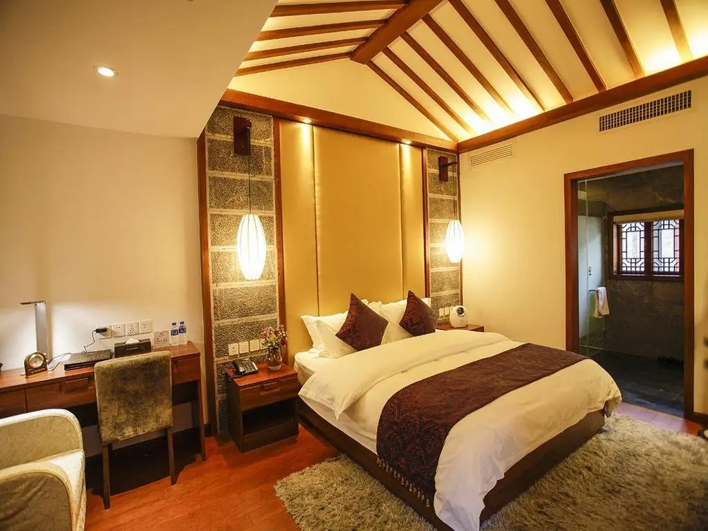 Lijiang Xi Yuan Xi Boutique Hotel — фото 1
