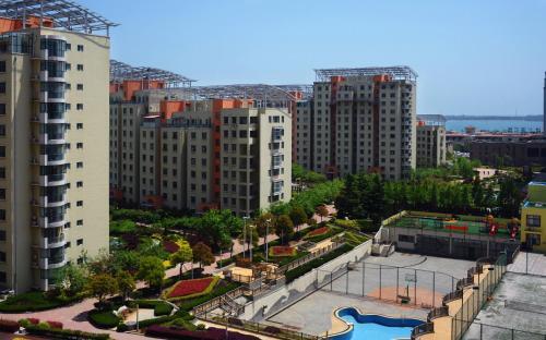 Циндао: Qianxilong Apartment