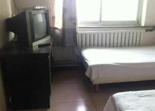 Баодин: Zhoujie Inn