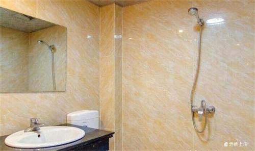 Лешан: Emeishan Sanyuan Shuzhuang Home Stay