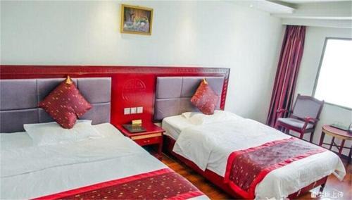 Лешан: Emeishan Sanyuan Shuzhuang Home Stay