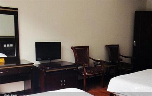 Лешан: Emeishan Sanyuan Shuzhuang Home Stay